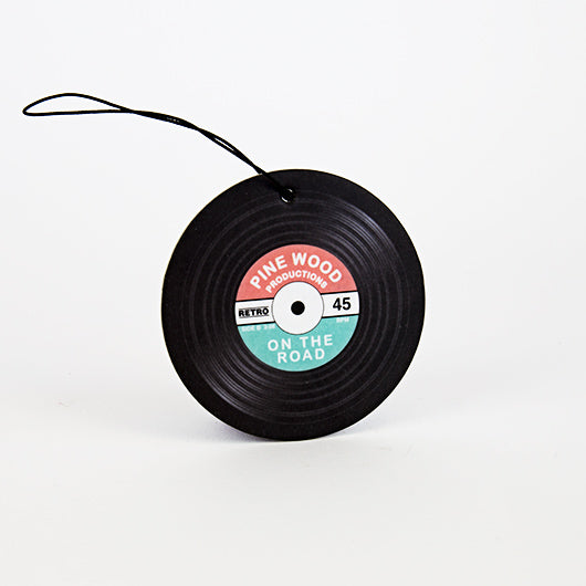 Vinyl record-shaped pinewood-scented car air freshener on white background – retro design, perfect gift for music lovers.