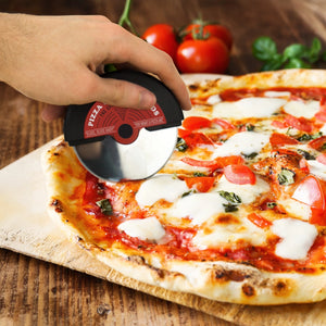 Back view of vinyl pizza cutter being used to slice pizza.