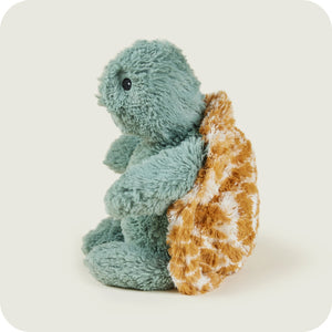 Warmies Baby Turtle profile view highlighting soft texture and detailed shell.