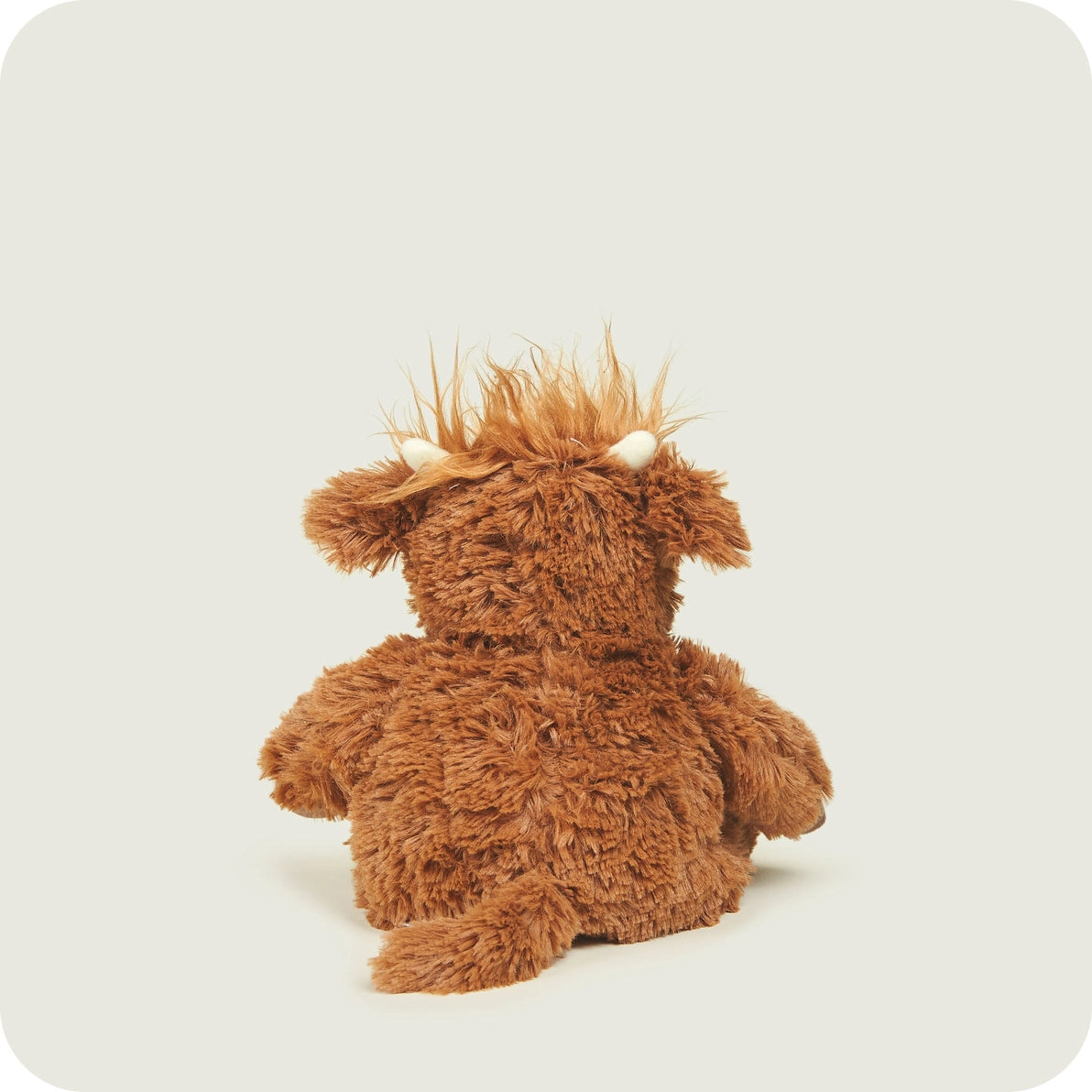 Junior Highland Cow plush toy showing side profile.