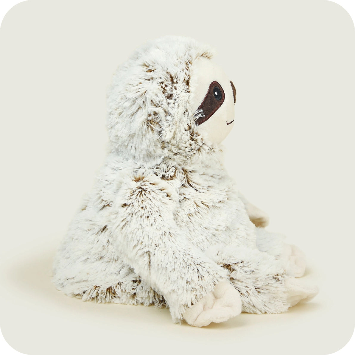 Other side profile of Warmies Marshmallow Sloth heatable soft toy highlighting plush fabric.