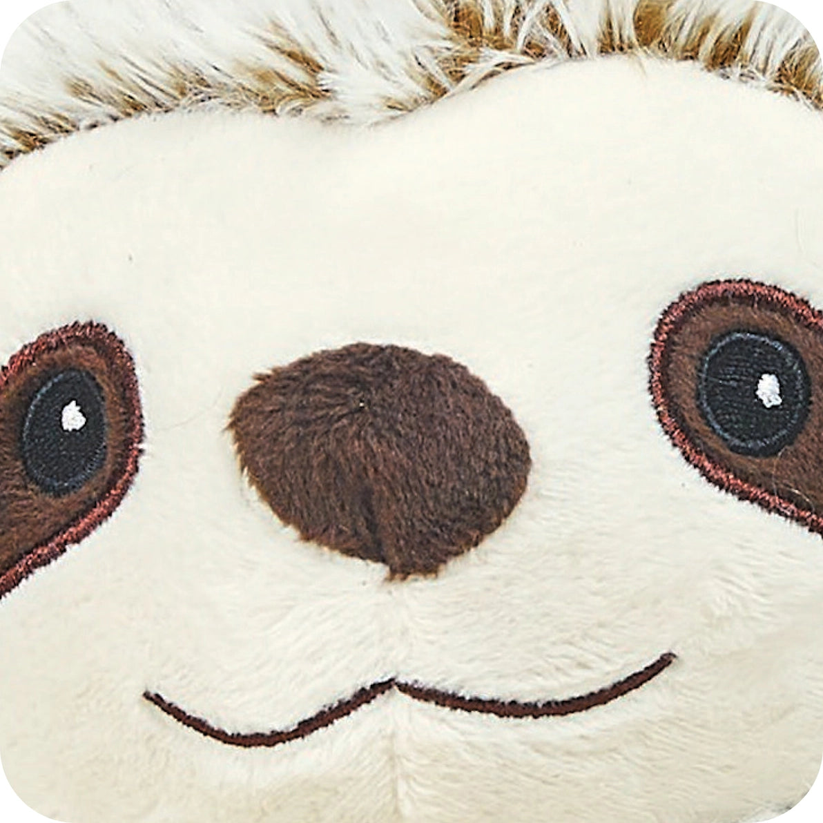 Close-up of Warmies Marshmallow Sloth embroidered eyes, nose and stitched smile detail.