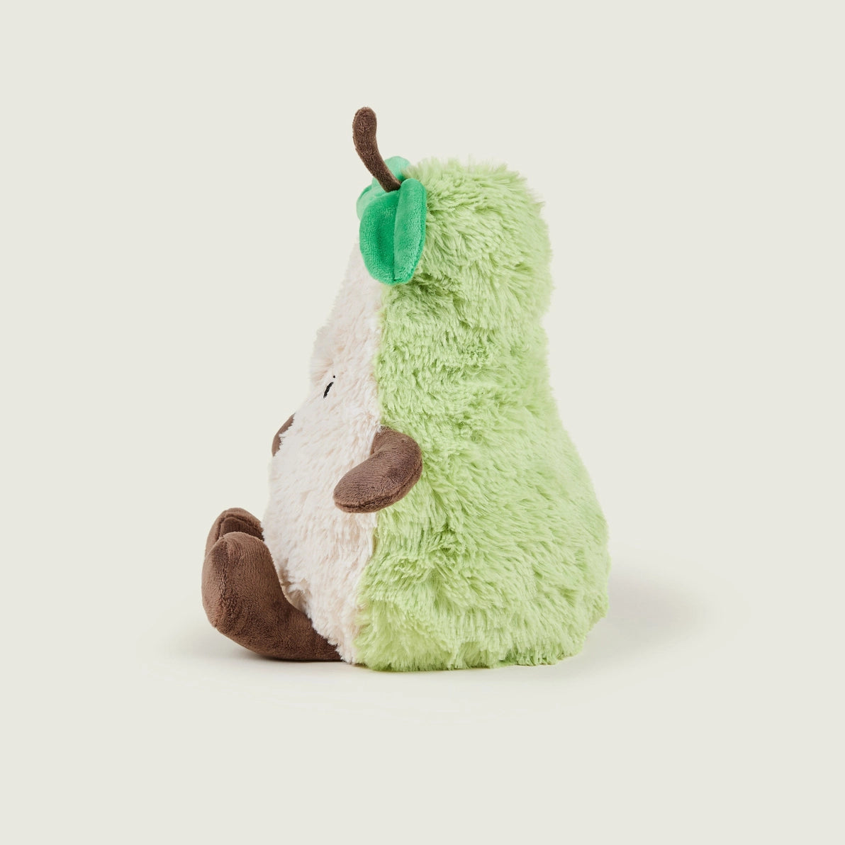 Warmies Pear microwaveable plush toy side profile.