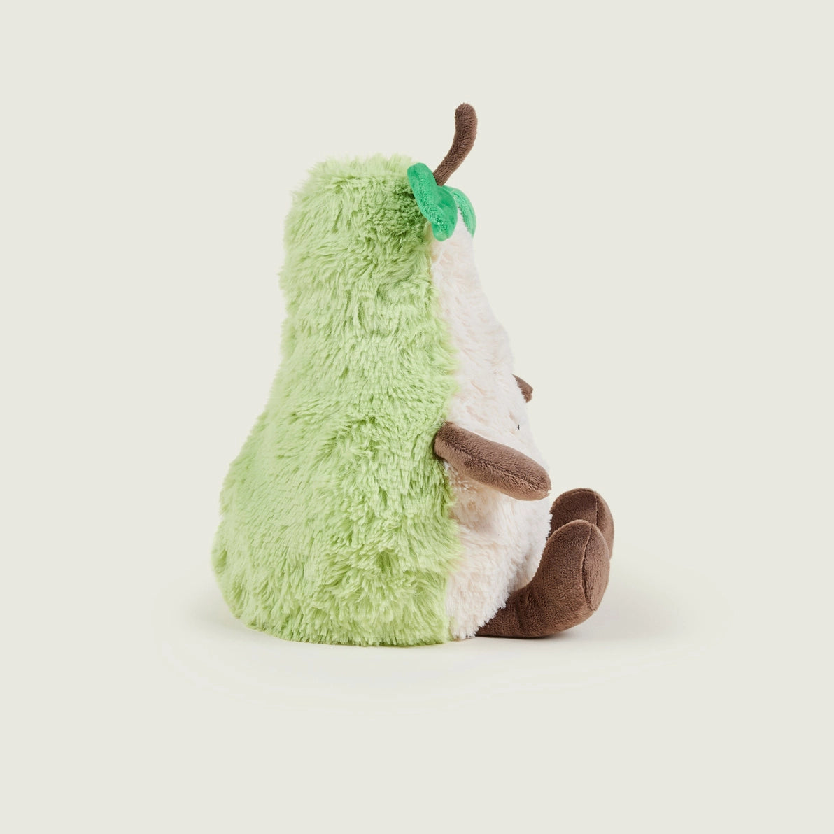 Warmies Pear cuddly plush toy angled side view.