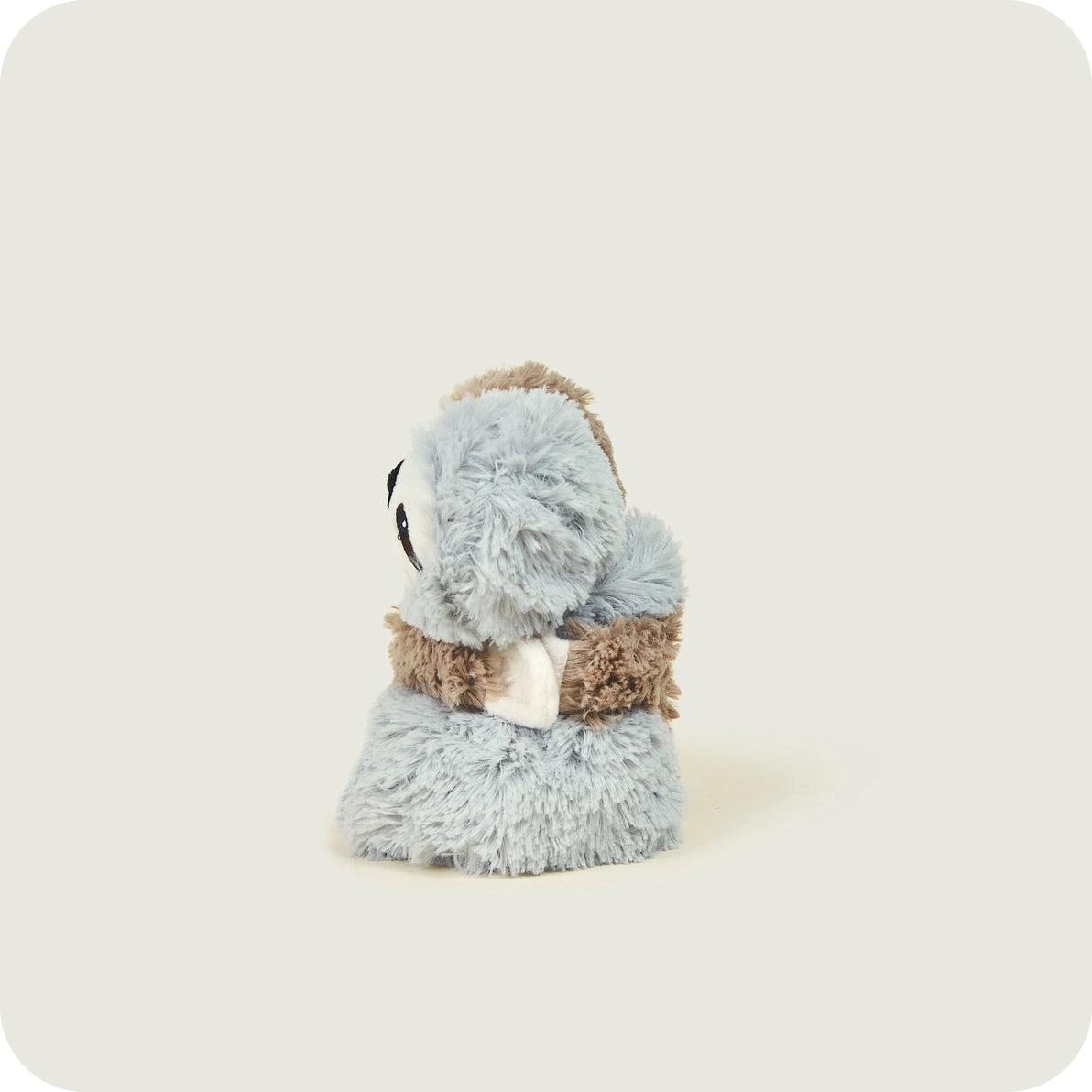 Side view of Warmies Warm Hugs Sloths hugging, microwaveable lavender plush.