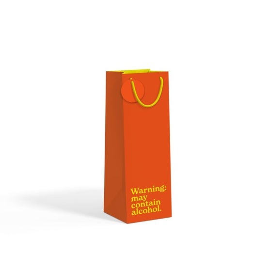 Burnt orange bottle gift bag with yellow text on white background