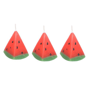 Set of 3 novelty candles shaped like watermelon slices, front view.