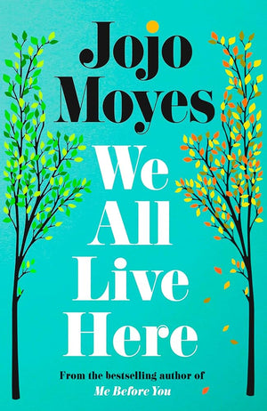 Cover of We All Live Here by Jojo Moyes, featuring a teal background with illustrated trees shedding green and orange leaves.