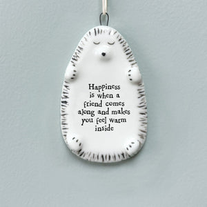 East of India porcelain hedgehog wall plaque with a heartfelt friendship quote - ‘Happiness is when a friend comes along and makes you feel warm inside.’ A thoughtful gift for friends and special occasions.