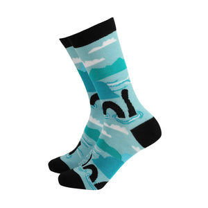 Pair of Women’s Nessie Bamboo Socks featuring a fun Loch Ness Monster design in teal and black.