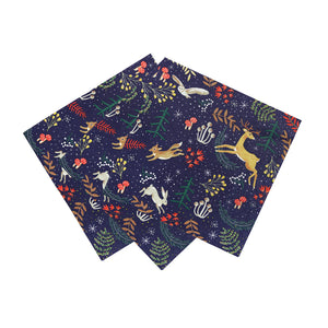 Set of three woodland-themed napkins with dark blue forest design and festive prints featuring deer, owls, and mushrooms.
