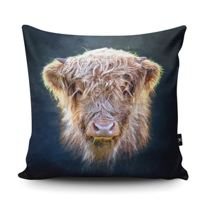 Close-up of the Little Highlander Highland Cow Cushion, showcasing its realistic Highland cow print on a deep charcoal backing.