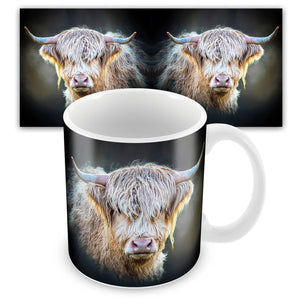 A Wraptious Shadow Gaze ceramic mug showcasing a close-up of a Highland cow with long shaggy fur and curved horns, presented with a matching panoramic background design.