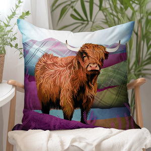 A cosy living space with a Tartan Highland Cow cushion on an armchair, showcasing a colourful Highland cow design.