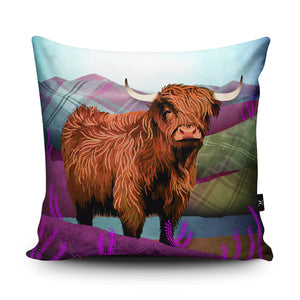 A close-up of the Tartan Highland Cow cushion, highlighting its soft suede texture and bold Scottish-inspired artwork.