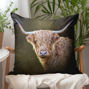 Twilight Highland Cow Cushion styled in a cosy living room setting, highlighting its 43cm x 43cm size and deep colour tones.