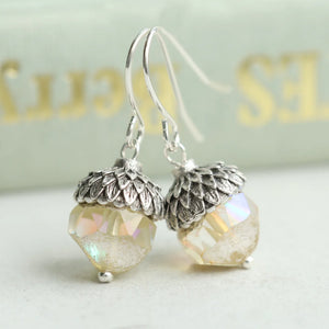 Close-up of Yellow Opal Acorn Earrings with antique silver-tone cap