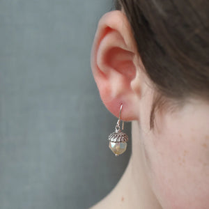 Yellow Opal Acorn Earrings displayed on a neutral background