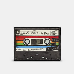 A black leather cardholder featuring a detailed cassette tape applique with hand-drawn typography listing classic 80s songs, including “Call Me,” “Dancing in the Dark,” “Don’t You Forget About Me,” and “Need You Tonight.”