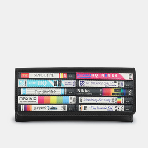 Front view of the Yoshi Be Kind Rewind Leather Glasses Case, featuring a vibrant VHS cassette design on black leather.