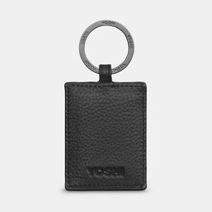 Back View: Black leather keyring with embossed Yoshi branding and a smooth finish.