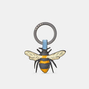 Front of soft blue leather keyring with handmade bee appliqué featuring queen bee and worker bees.
