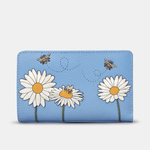 Front view: Yoshi Bee Happy leather purse in soft blue with bee and daisy appliqués.
