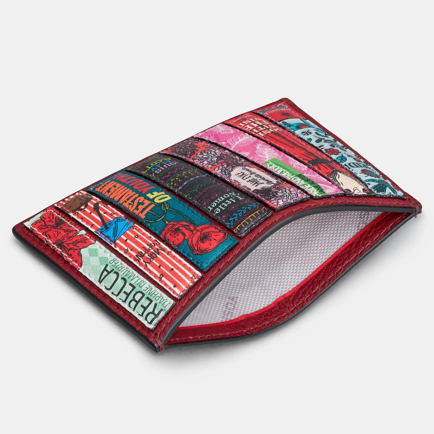 Side View: Angled side shot of the slim card holder showing stitched edges and curved shape.