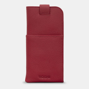 Back of the cherry red leather glasses case with soft grain texture, subtle Yoshi logo, and rear slip pocket for storing a cloth or notes.