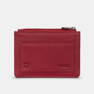 Back of cherry red leather Yoshi purse with two external card slots, embossed Yoshi logo, and soft grain leather texture.