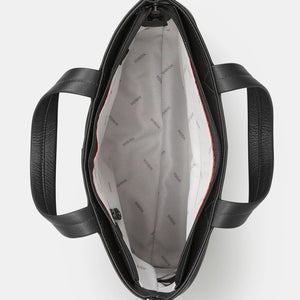 Top view of Horror Bookworm Black Leather Bag showing spacious zip-top interior with light lining and pockets.