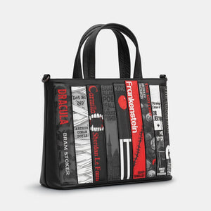 Side view of Horror Bookworm Black Leather Multiway Bag showing detailed book spine appliqué design.