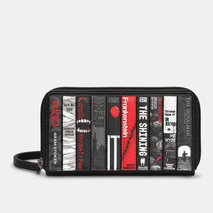 Horror Bookworm Black Leather Purse showing horror book spine appliqué design in red, black and white tones.
