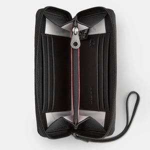 Interior of Horror Bookworm leather purse with multiple card slots and zip coin pocket.