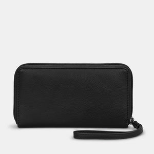 Back view of Horror Bookworm black leather purse with wrist strap and zip-around closure.