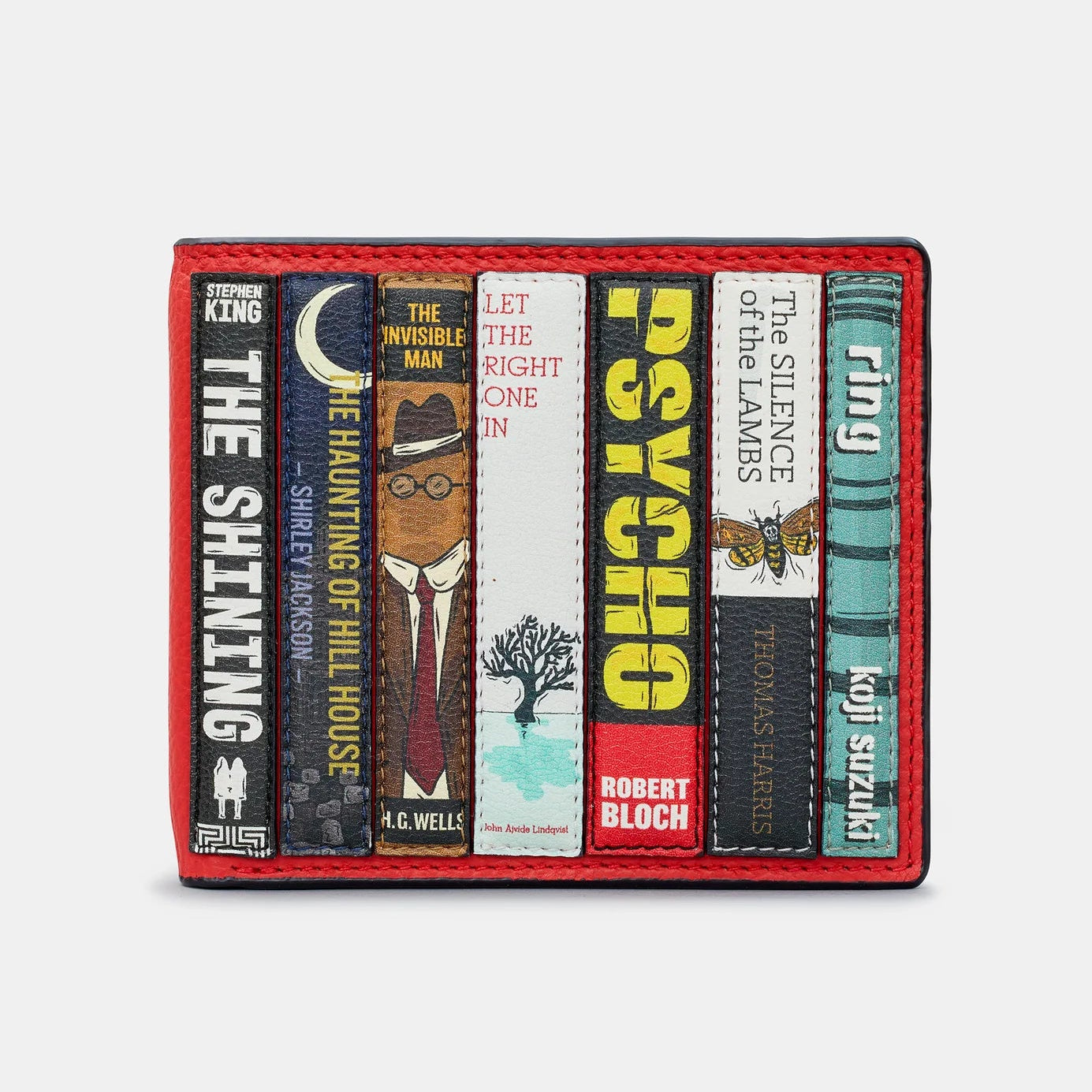 Front of Yoshi Horror Bookworm Leather Wallet showing stitched appliques of classic horror novels like The Shining, Psycho, and The Haunting of Hill House on red and black leather.