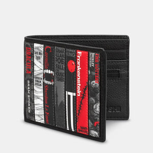 Side profile of Yoshi Horror Bookworm leather wallet showing book spine applique and slim bi-fold design.