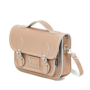 Side view of the iced coffee beige coloured leather satchel with the shoulder strap.