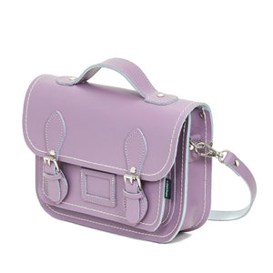 Side view of the Pastel Violet Leather Satchel. This image shows the removable shoulder strap.