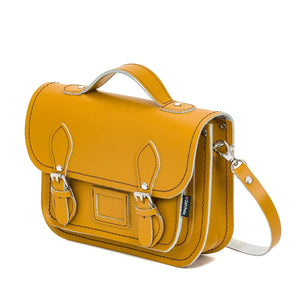 Side image of the Yellow leather satchel showing the removable leather strap.