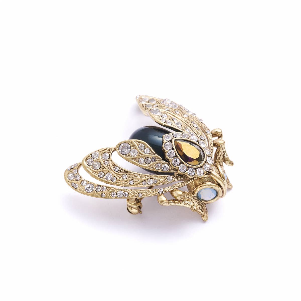 Side angle of Bejewelled Moth Brooch showing gold detailing, crystals, and simulated pearls.