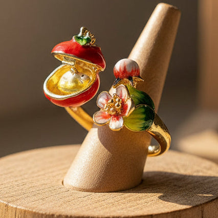 Apple Blossom and Mouse ring with pink enamel flowers and tiny mouse detail.