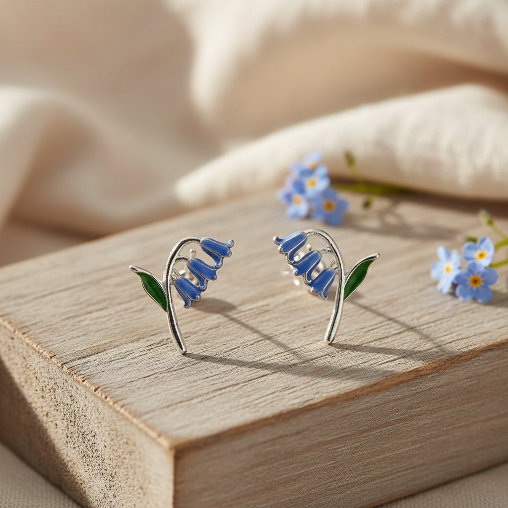 Bluebell stud earrings with purple enamel flower design - product shot.