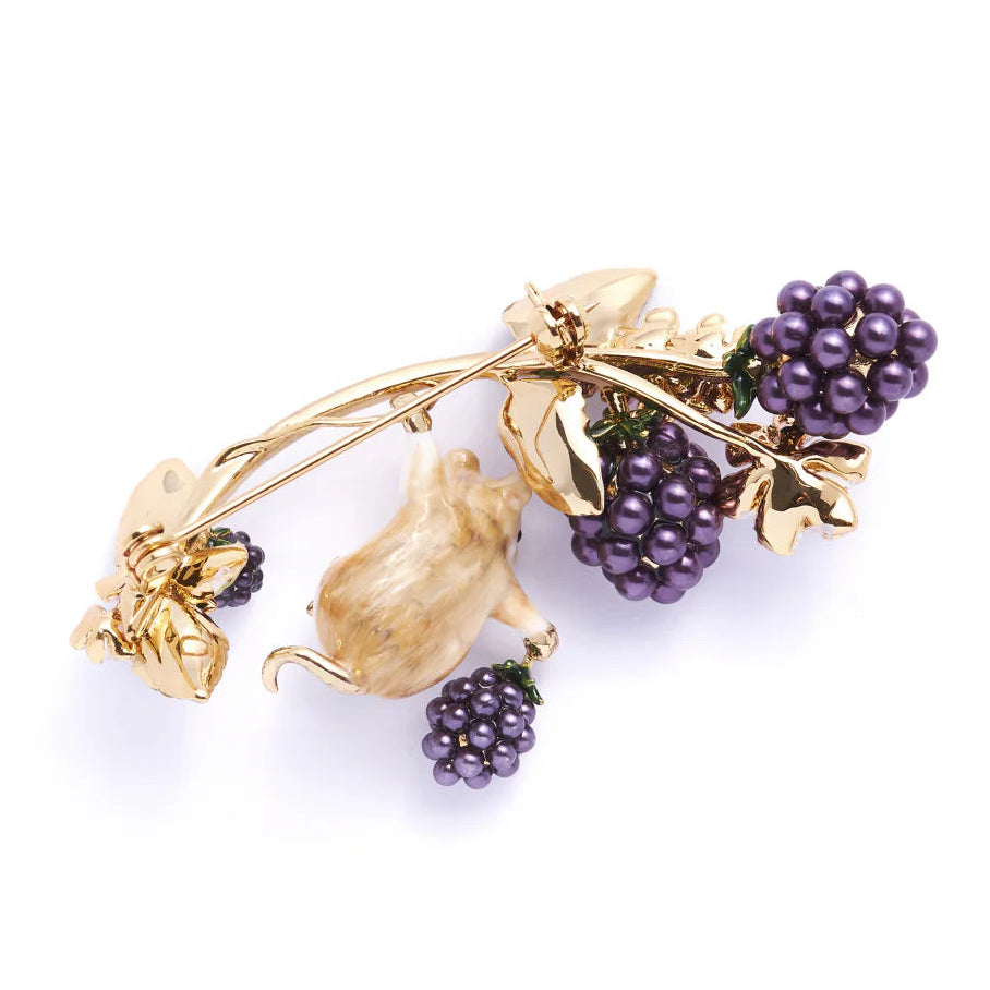 Back view of Blackberry & Mouse Brooch showing gold-plated structure and enamel detailing by Bill Skinner.
