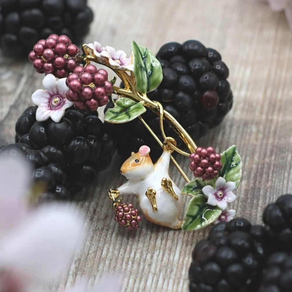 Blackberry & Mouse Brooch by Bill Skinner styled with real blackberries, showing detailed enamel berries and flowers.