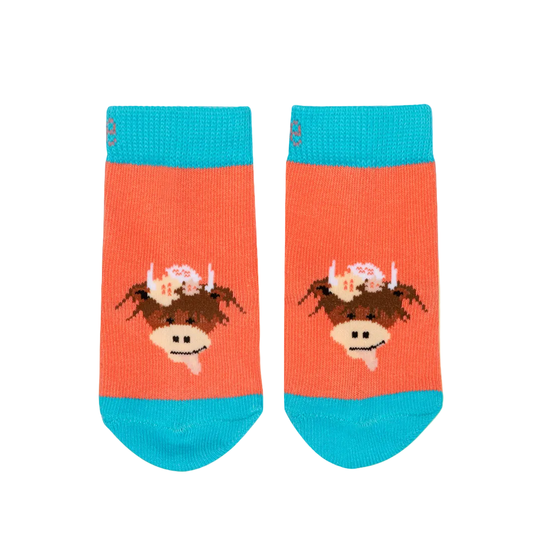 Coral Bonnie highland cow socks second view on pastel background