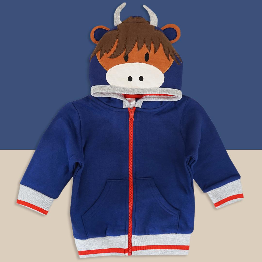 Navy highland cow hoodie flat lay on split background
