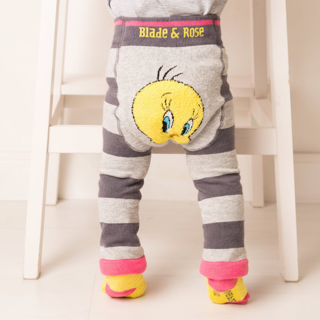 Tweety Bird leggings on standing baby - front view on white background