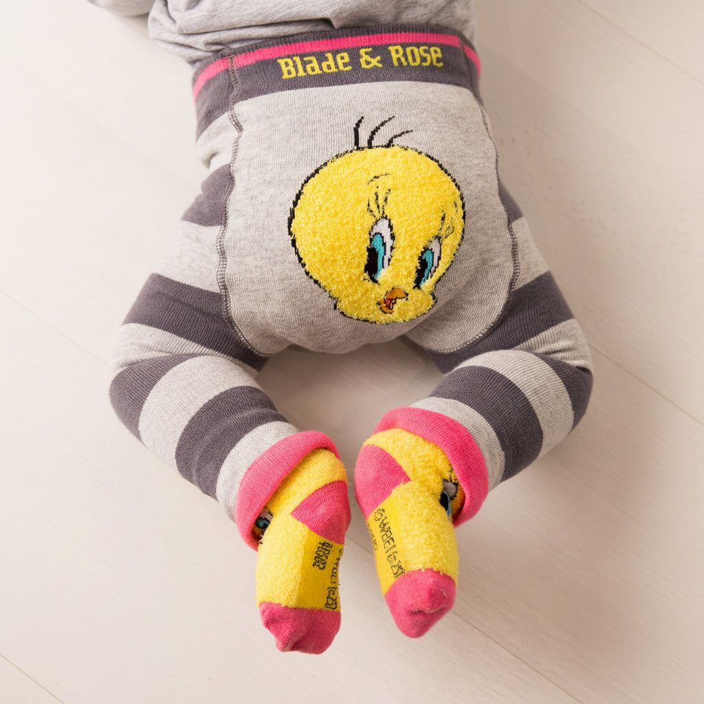 Tweety Bird baby leggings close-up showing character bum design on cream background