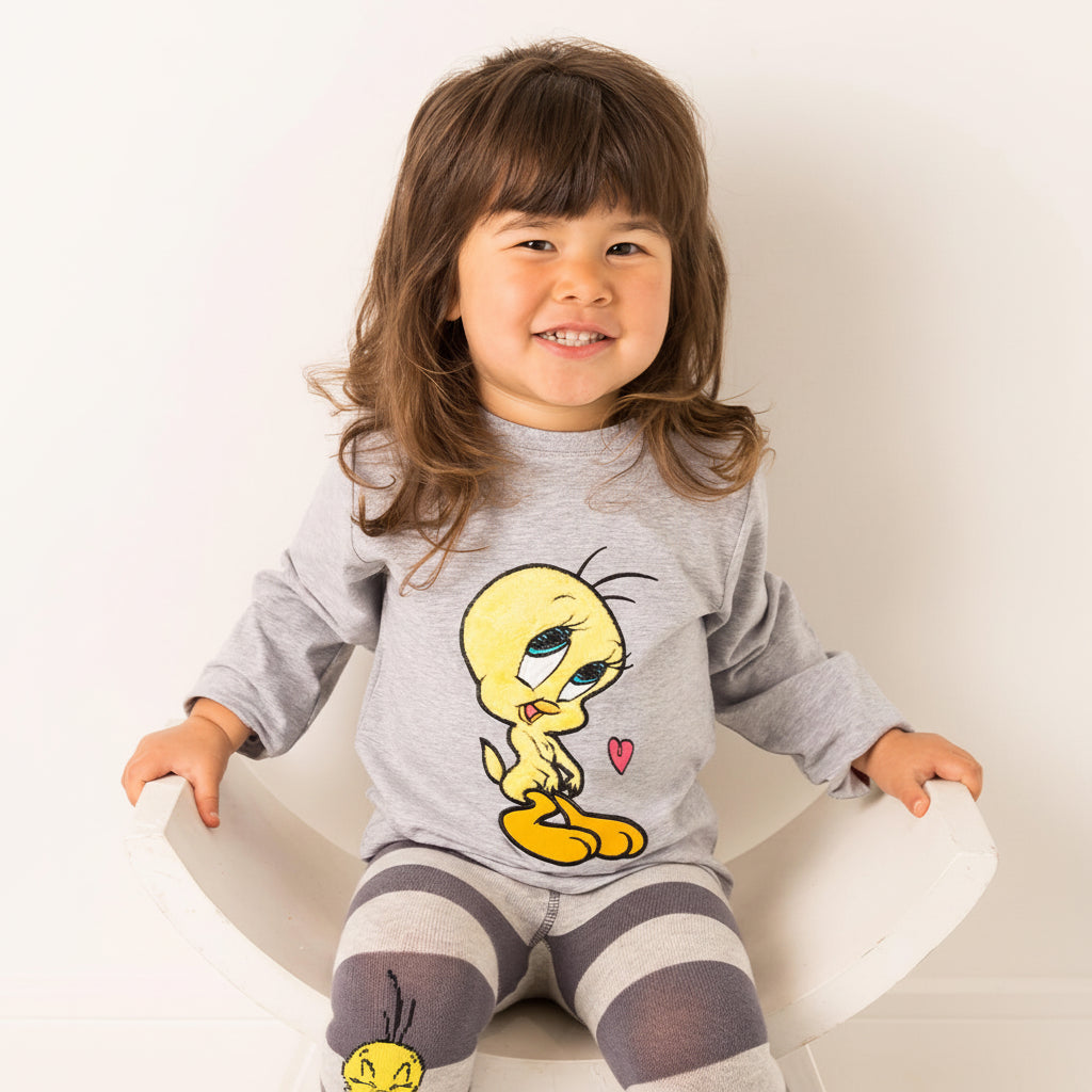 Tweety Bird grey cotton top worn by toddler - front view on white background